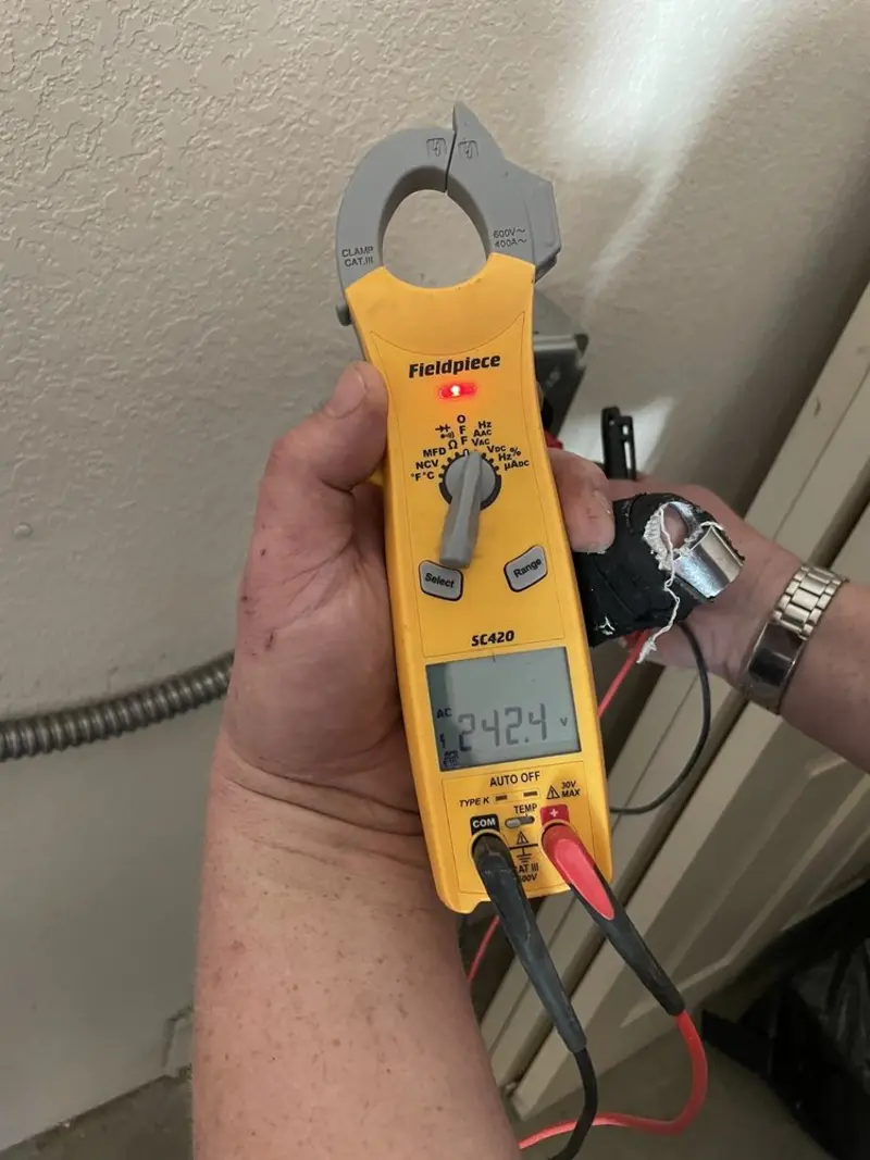 Voltage testing with clamp meter during Generator Installation in Pacific Grove